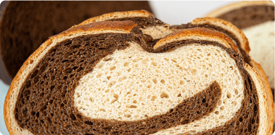 Sliced marble rye and pumpernickel bread